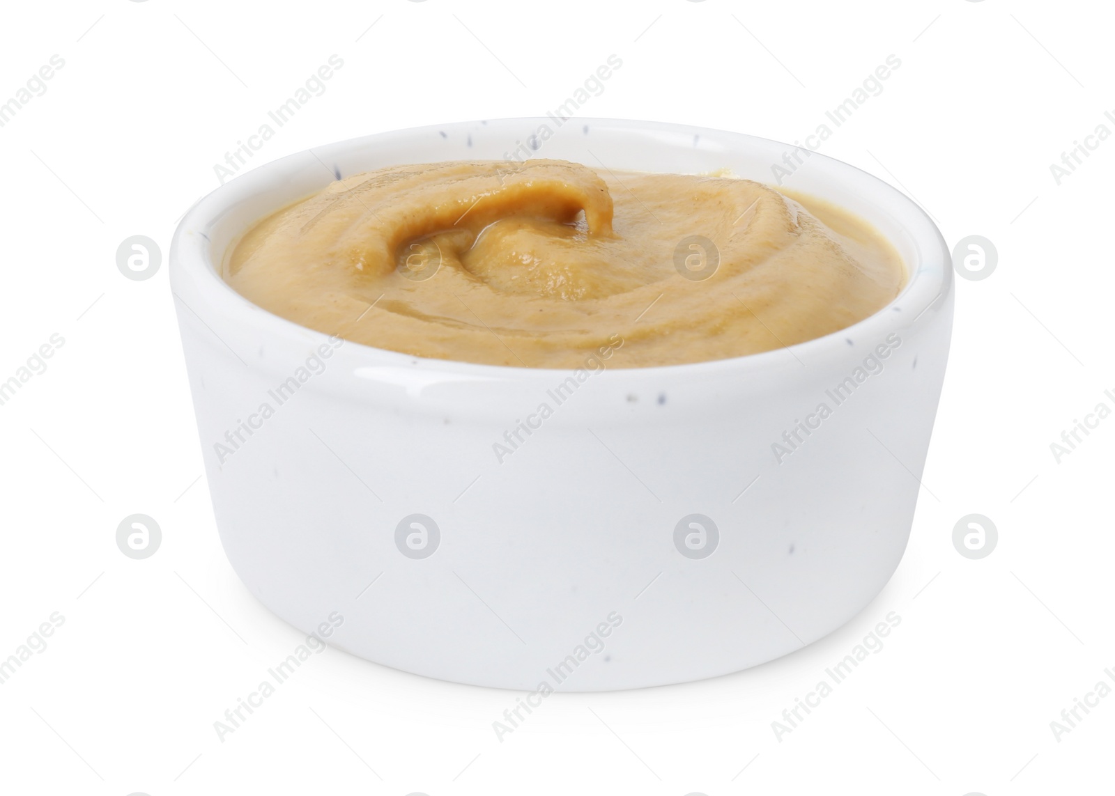 Photo of Fresh tasty mustard sauce in bowl isolated on white