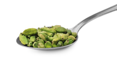 Photo of Spoon full of cardamom on white background, closeup