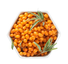 Fresh ripe sea buckthorn berries in bowl isolated on white, top view