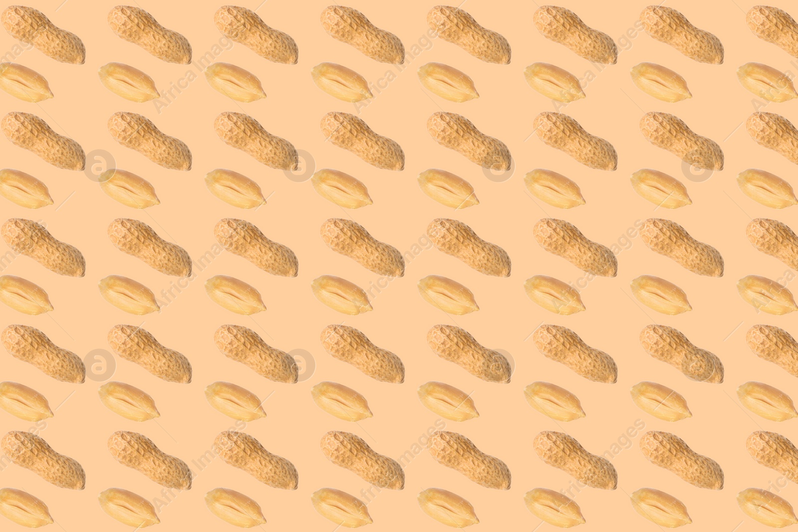 Image of Many peanuts on beige background. Food pattern