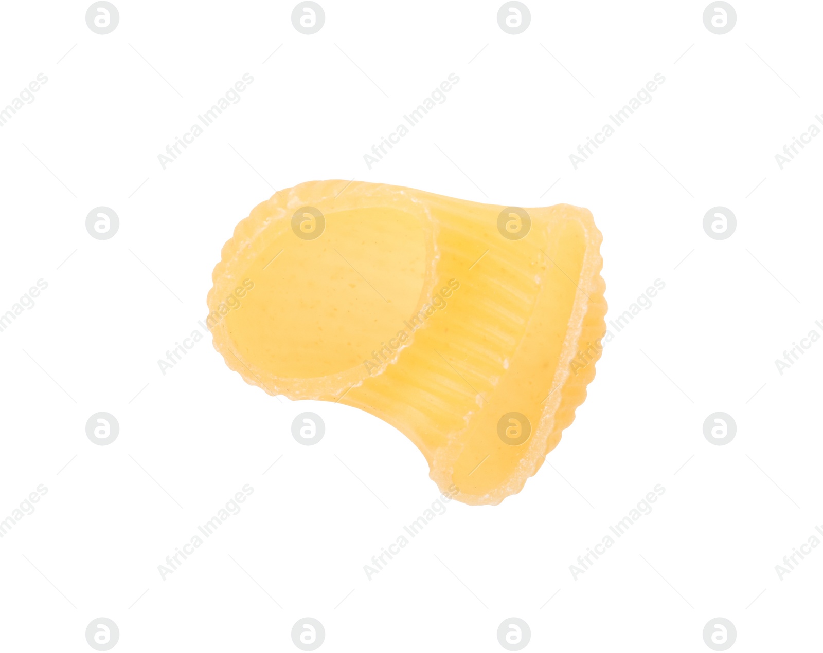 Photo of One piece of raw horns pasta isolated on white