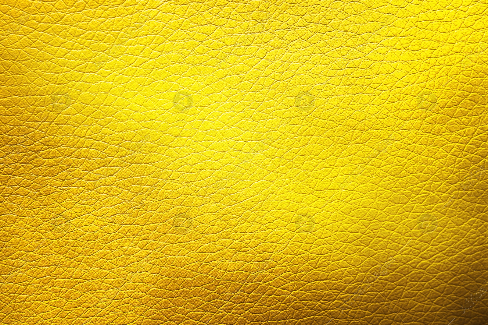 Image of Golden textured surface as background, closeup view