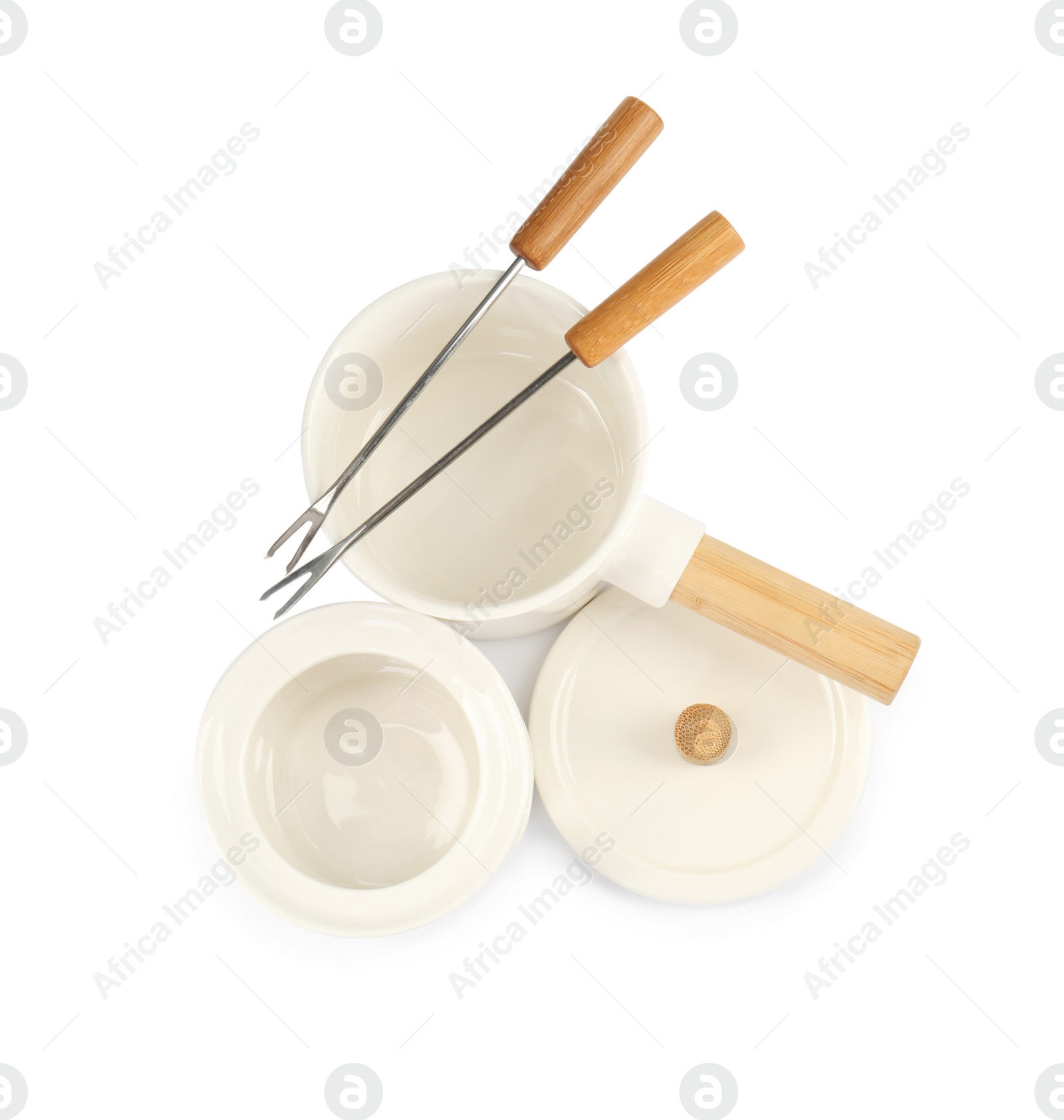 Photo of Fondue set isolated on white, top view. Kitchen equipment