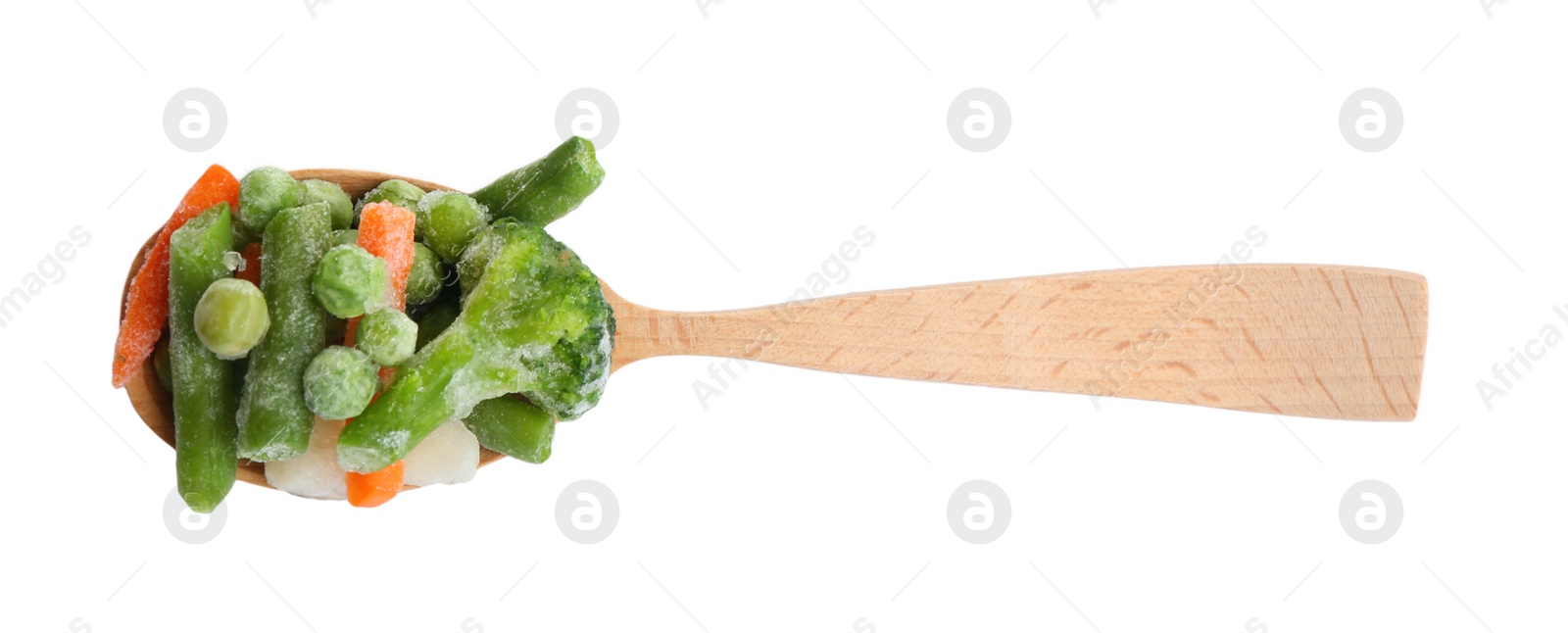 Photo of Frozen vegetables in wooden spoon isolated on white, top view