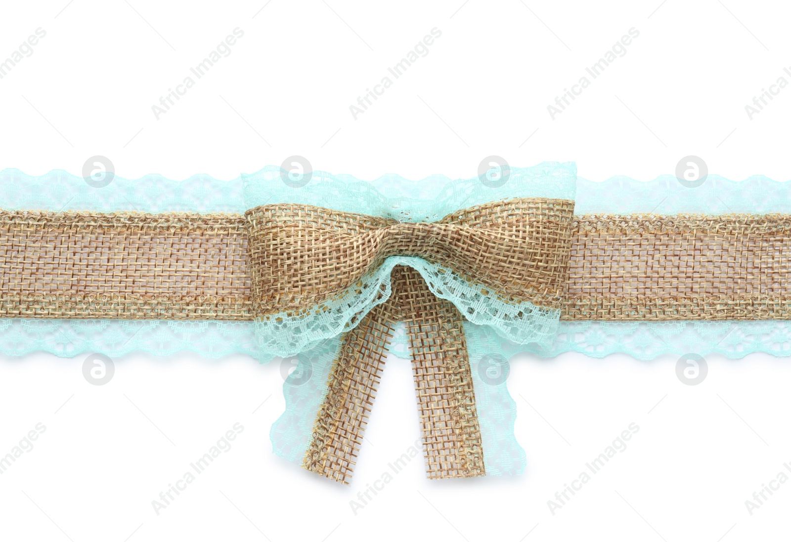 Photo of Burlap ribbon and bow with light blue lace on white background, top view