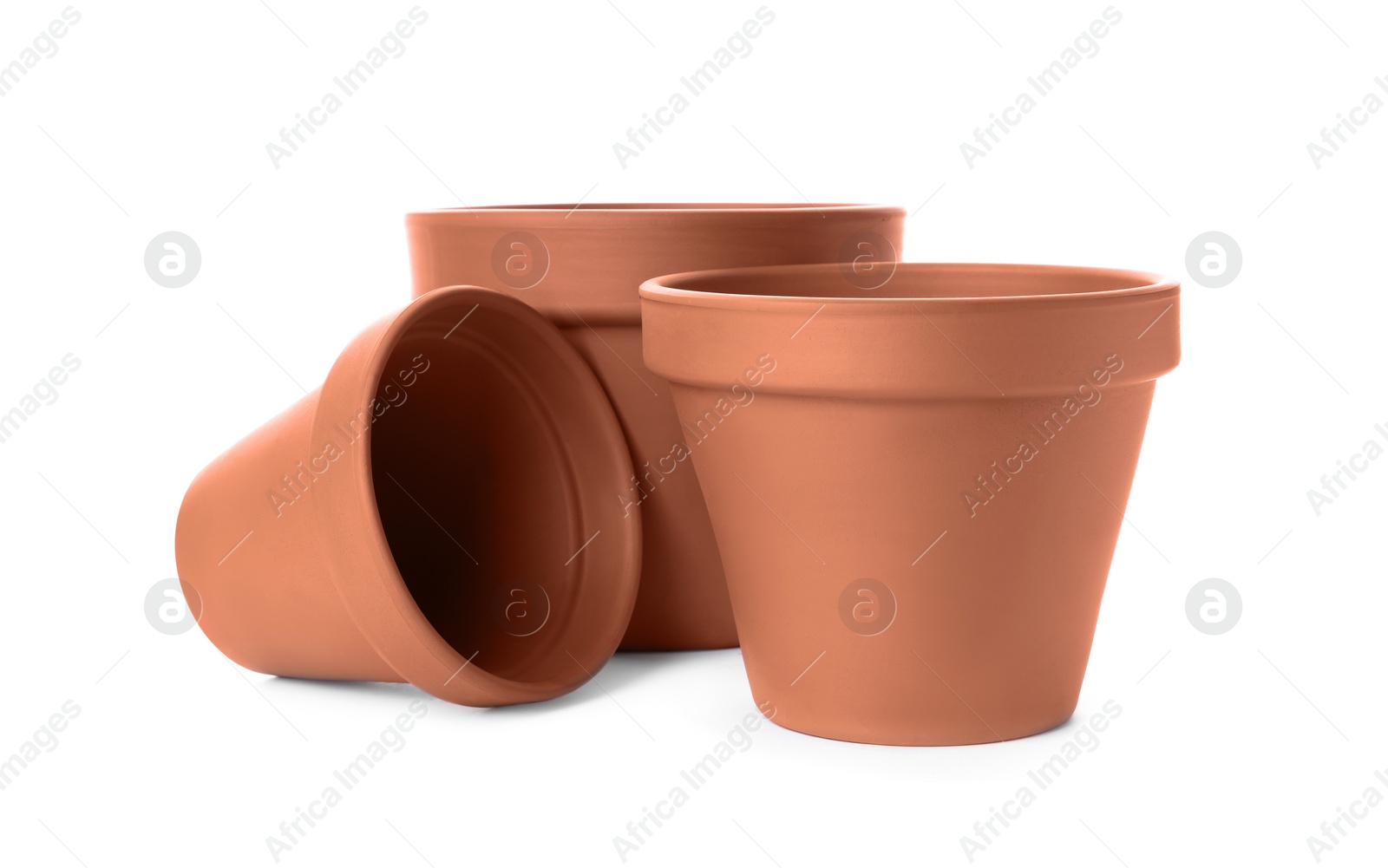 Photo of Stylish terracotta flower pots isolated on white