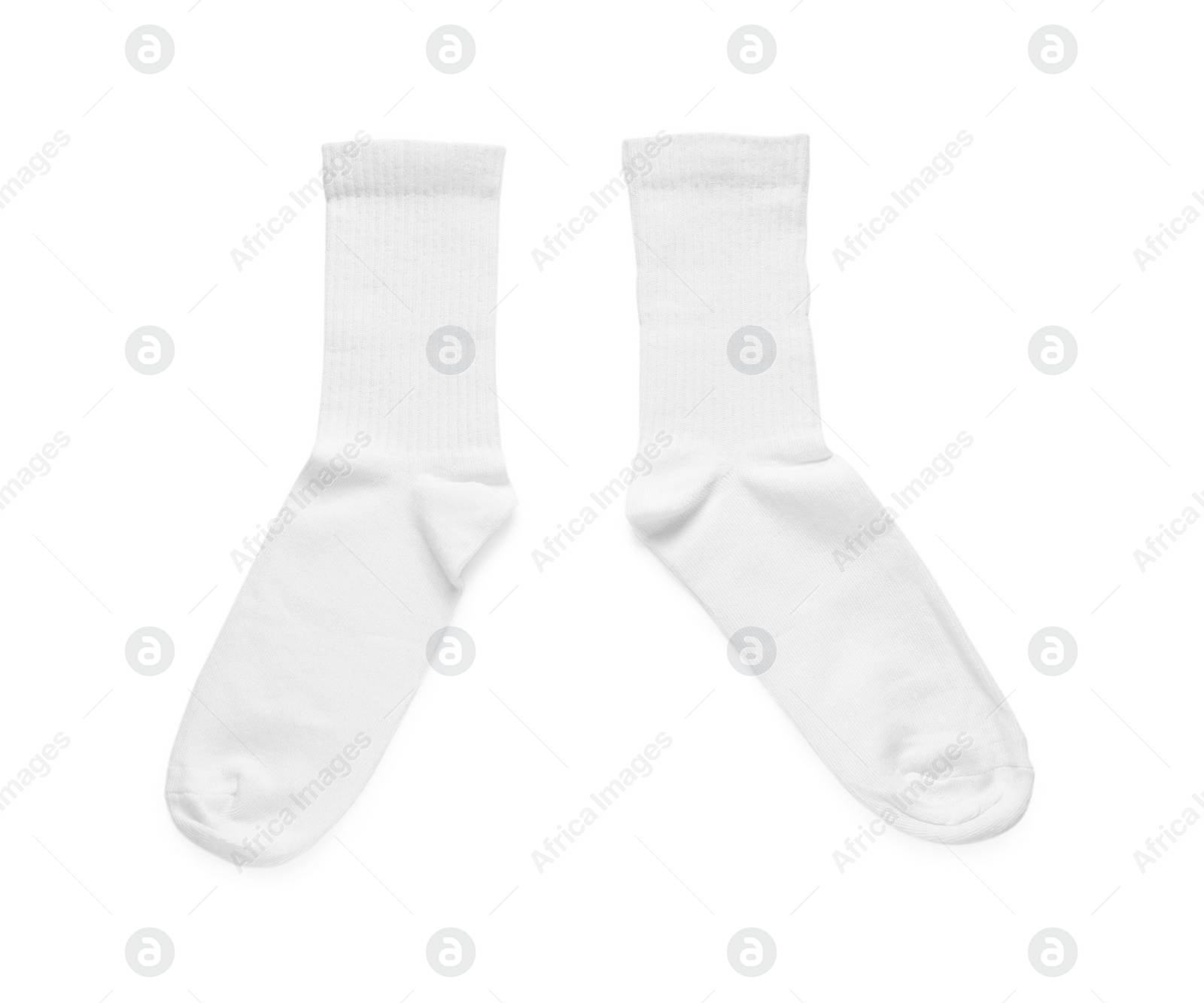 Photo of Pair of stylish clean socks isolated on white, top view