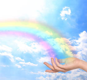 Image of Woman and rainbow as source of healing energy on sunny day, closeup