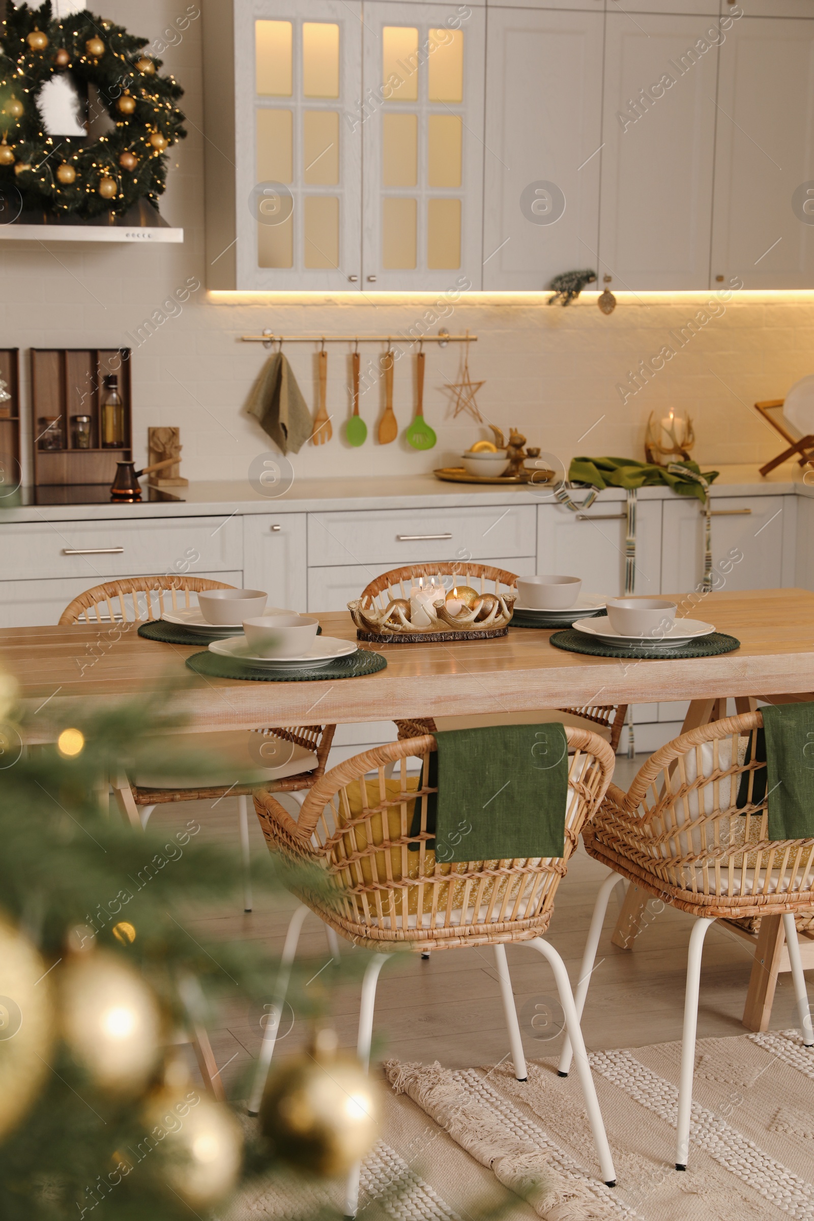 Photo of Cozy dining room decorated for Christmas. Interior design