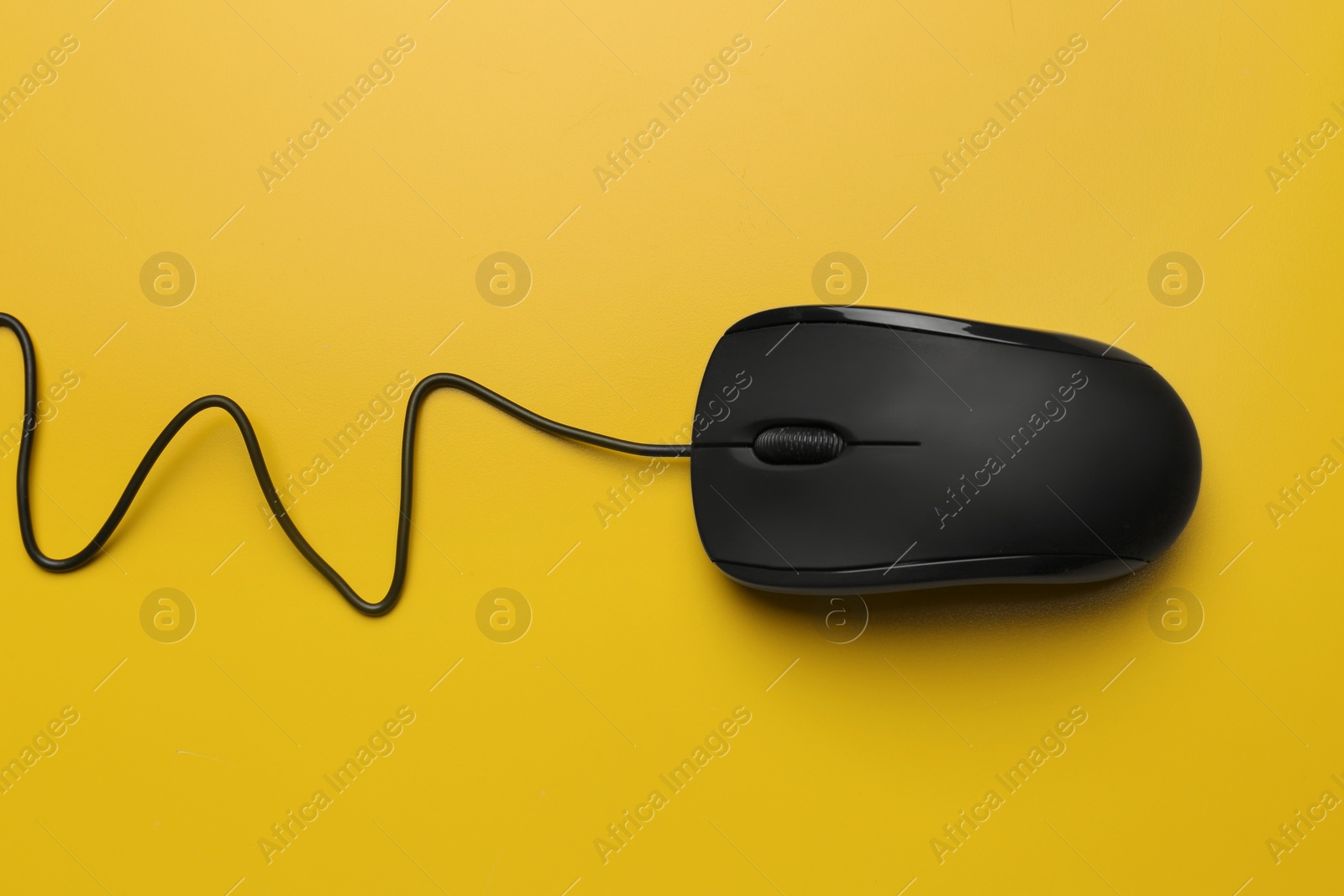 Photo of Modern computer mouse on color background, top view