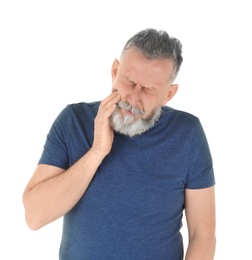 Photo of Man suffering from toothache on white background