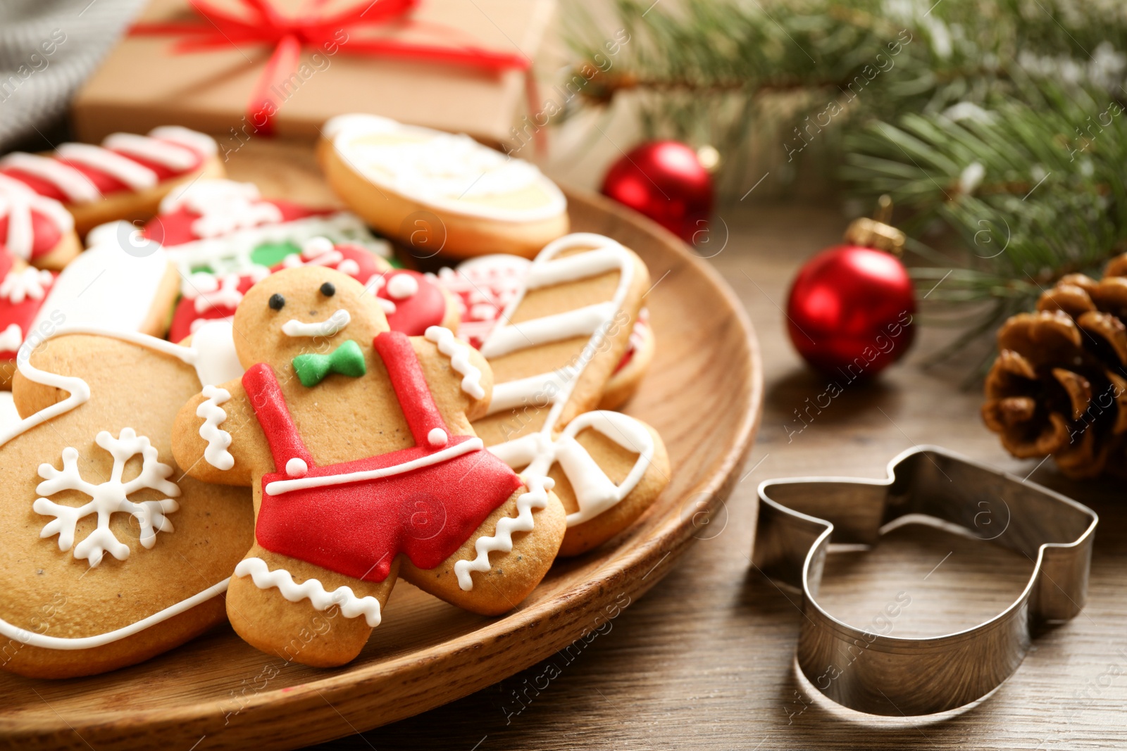 Photo of Tasty homemade Christmas cookies on wooden table