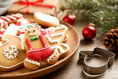 Photo of Tasty homemade Christmas cookies on wooden table