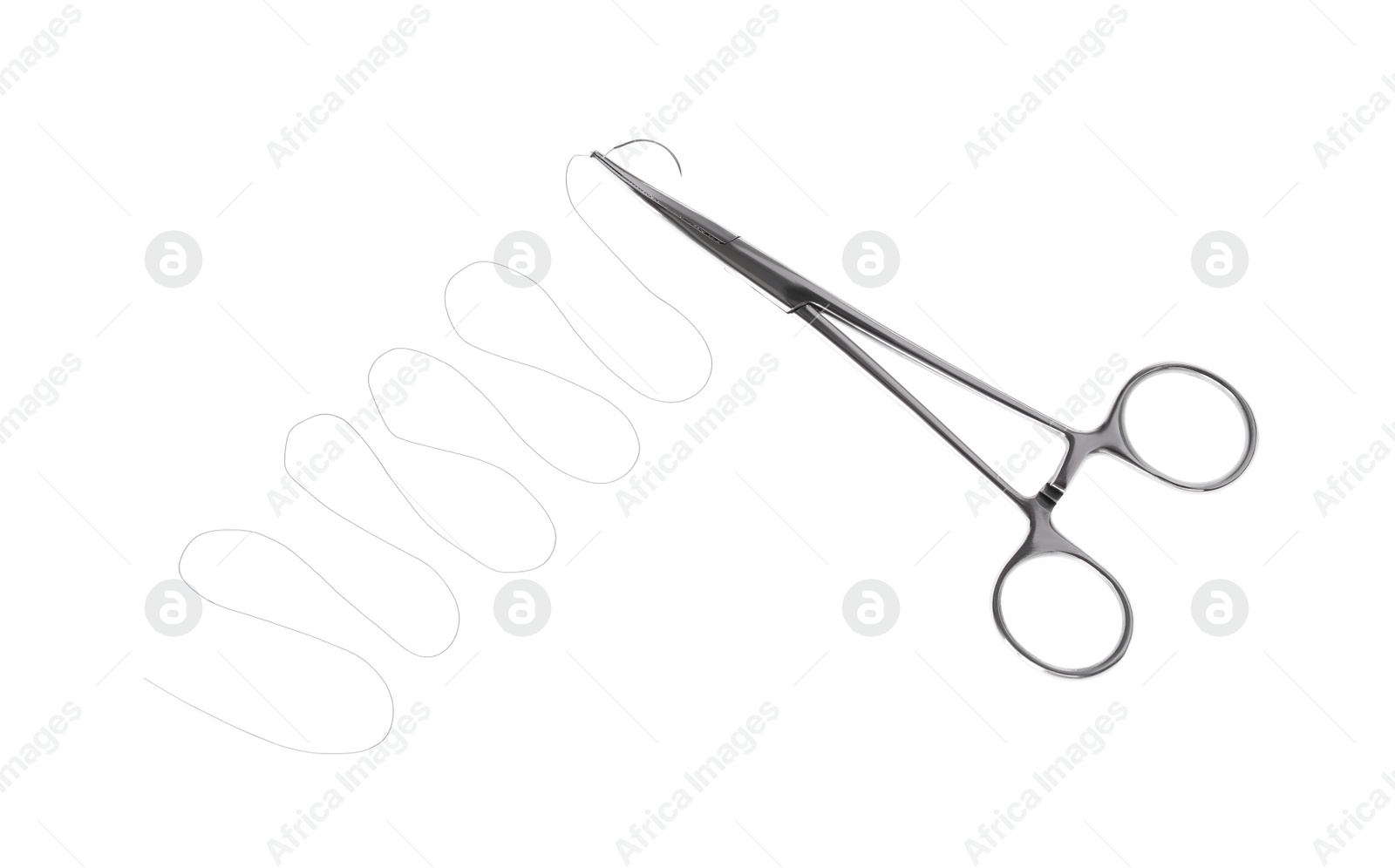 Photo of Forceps with suture thread on white background, top view. Medical equipment