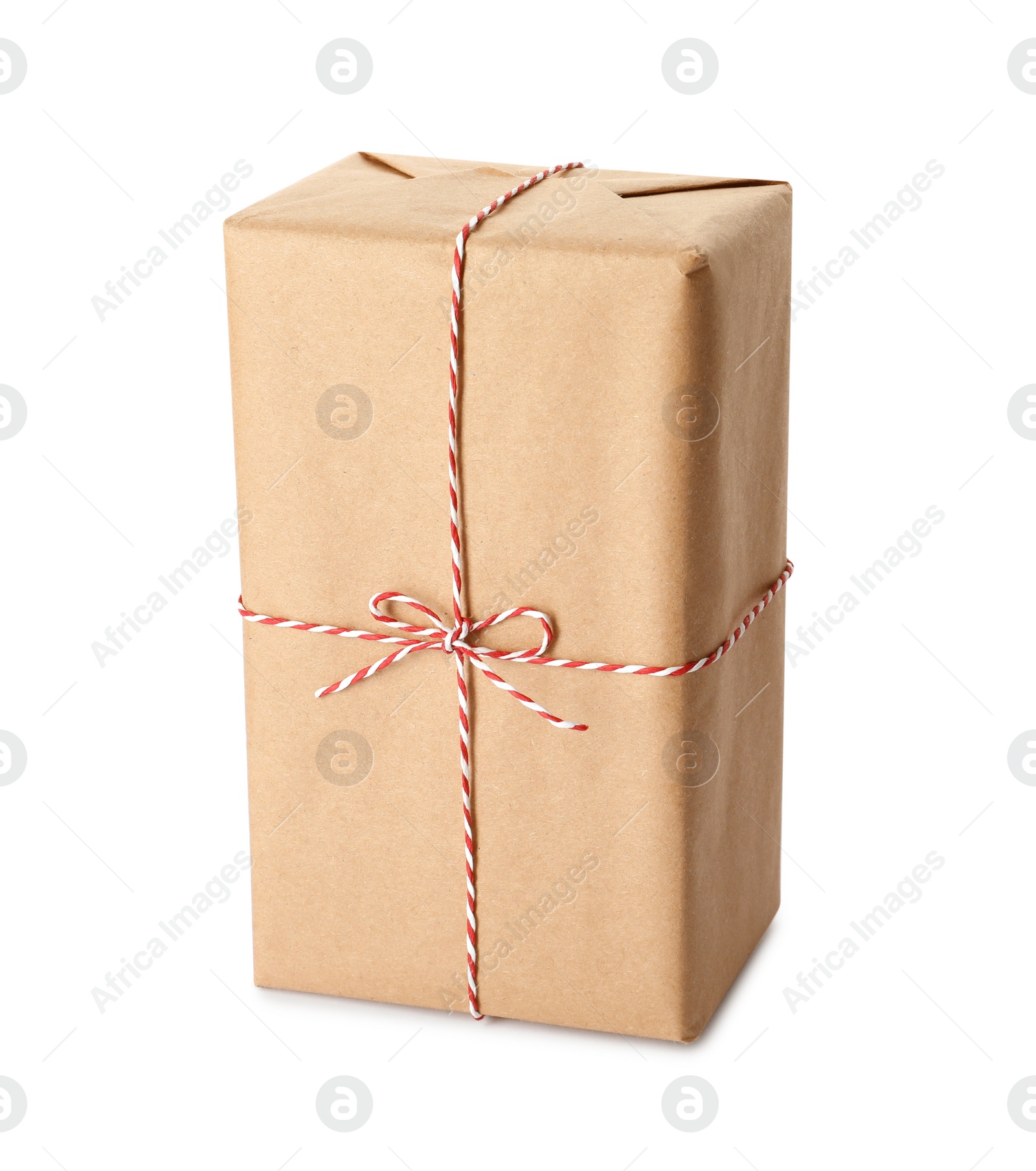 Photo of Gift box wrapped in kraft paper with bow isolated on white