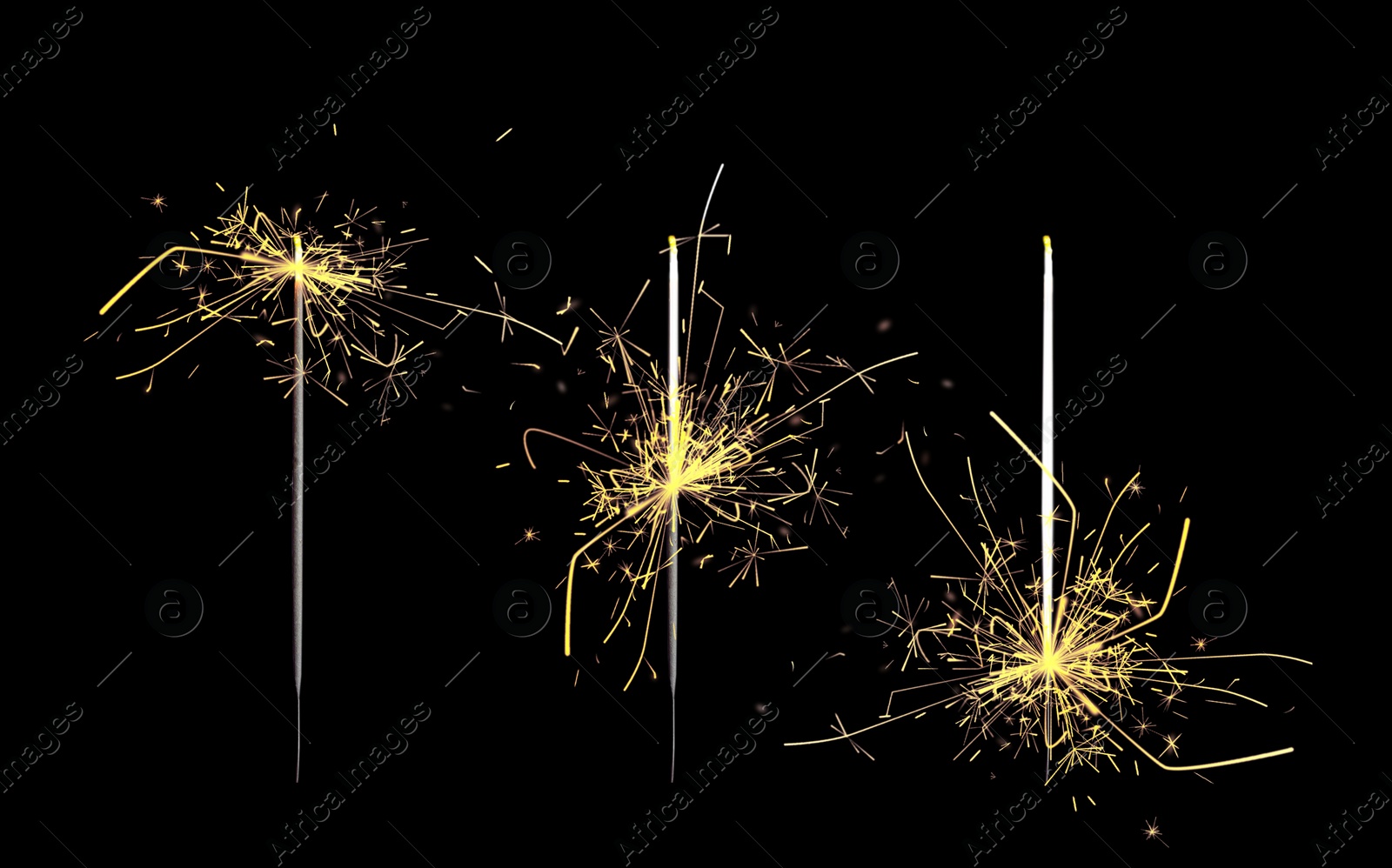 Image of Set of burning sparklers on black background. Party decor