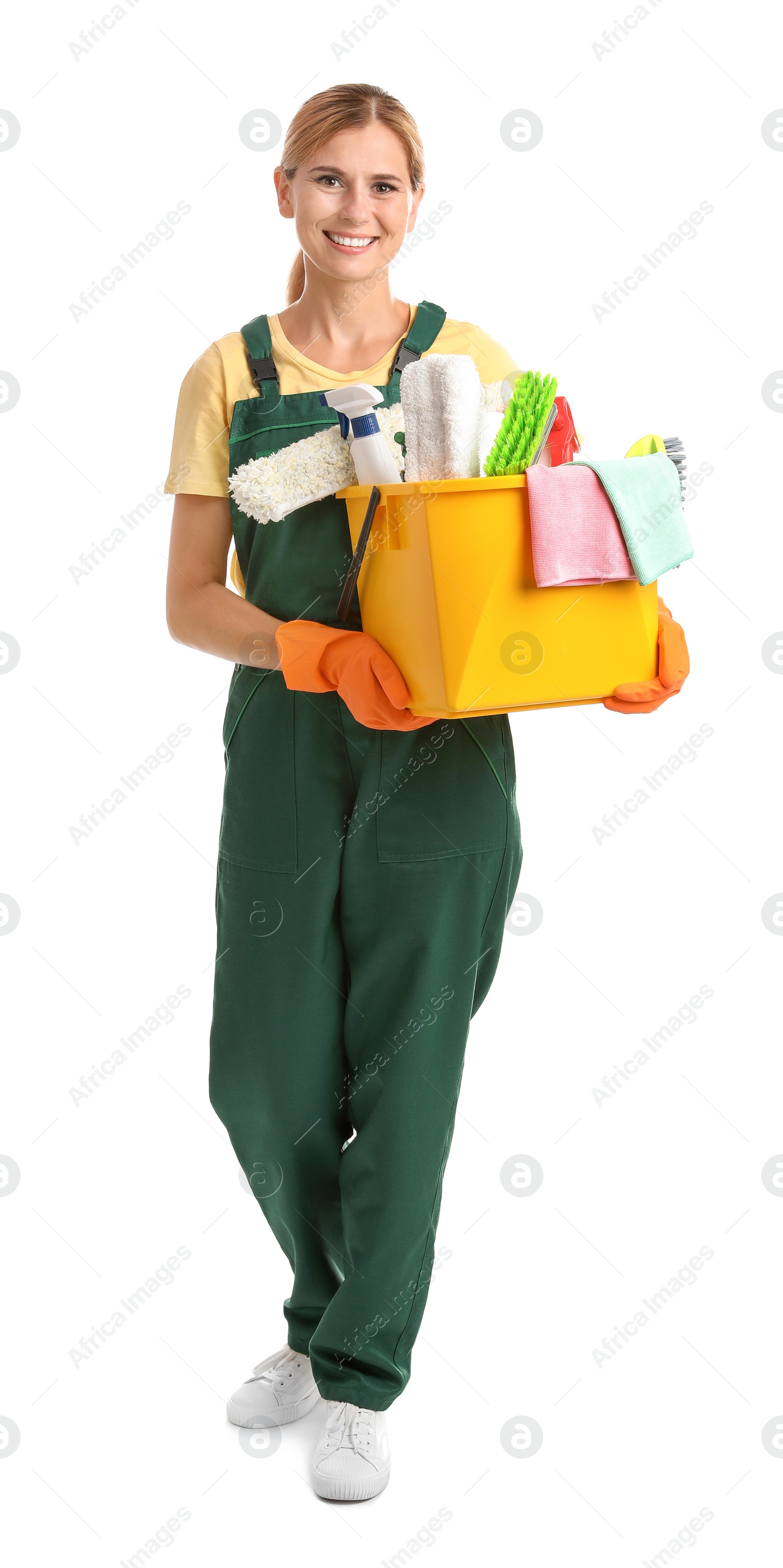 Photo of Female janitor with cleaning supplies on white background