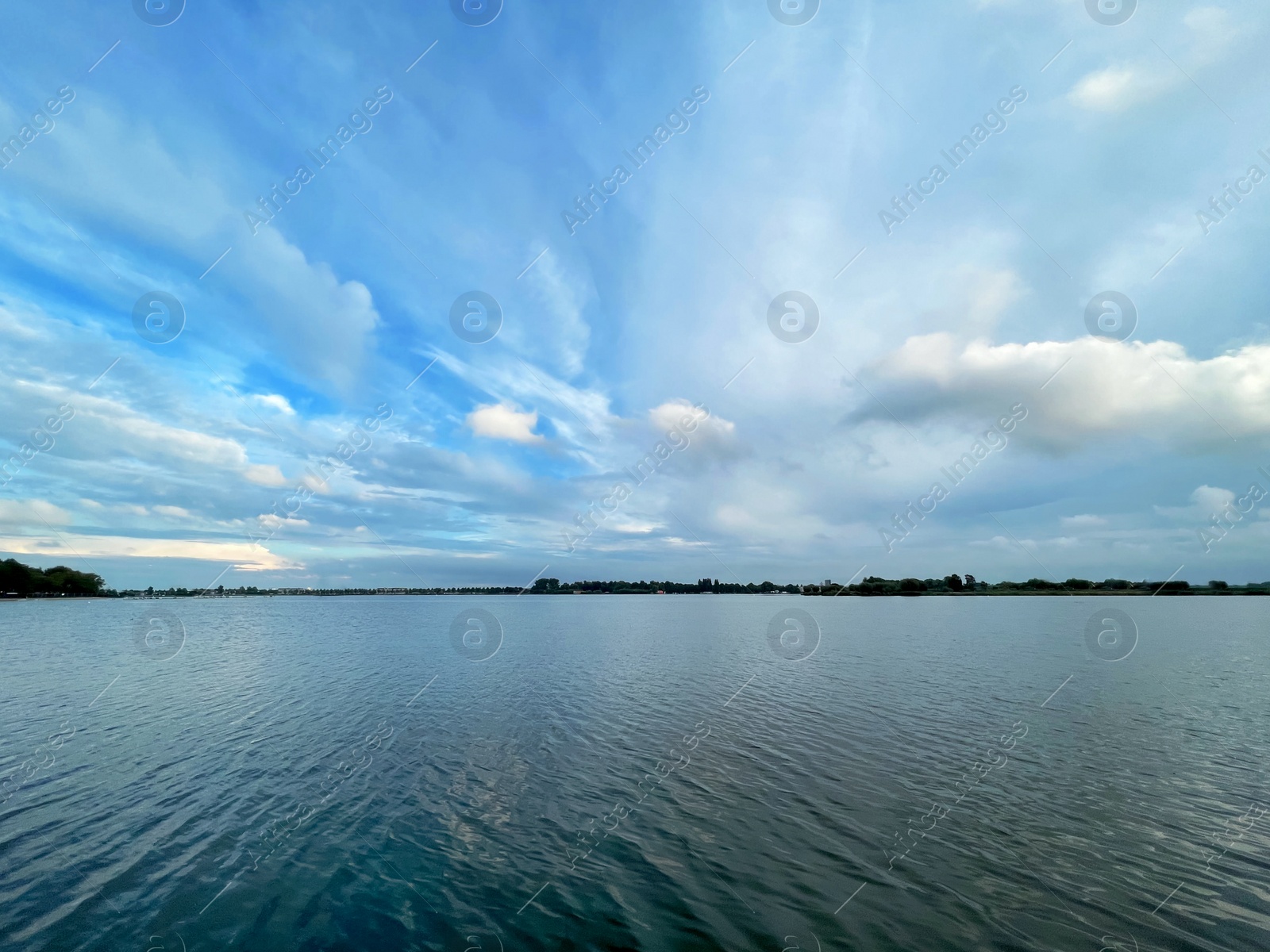 Photo of Picturesque view of river and cloudy sky