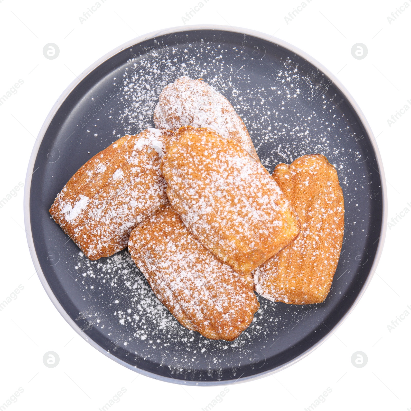 Photo of Delicious madeleine cakes with powdered sugar on white background, top view