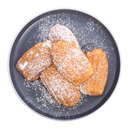 Photo of Delicious madeleine cakes with powdered sugar on white background, top view