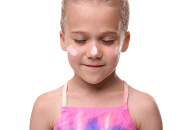 Photo of Cute girl with sun protection cream on her face against white background