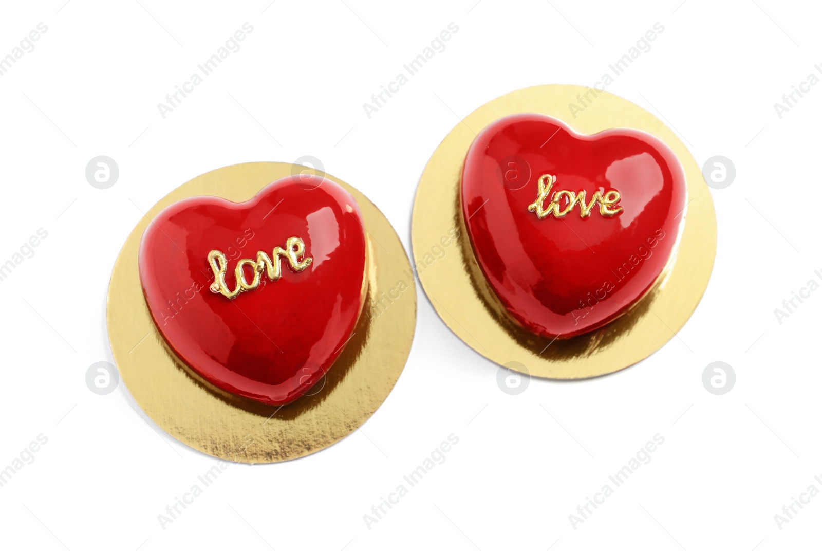 Photo of St. Valentine's Day. Delicious heart shaped cakes isolated on white, top view