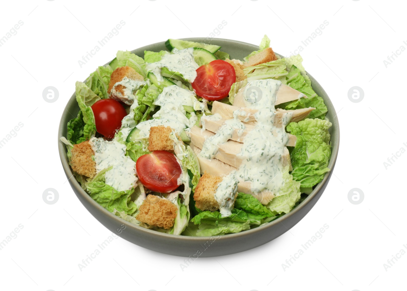 Photo of Bowl of delicious salad with Chinese cabbage, cucumber, meat and tomatoes isolated on white