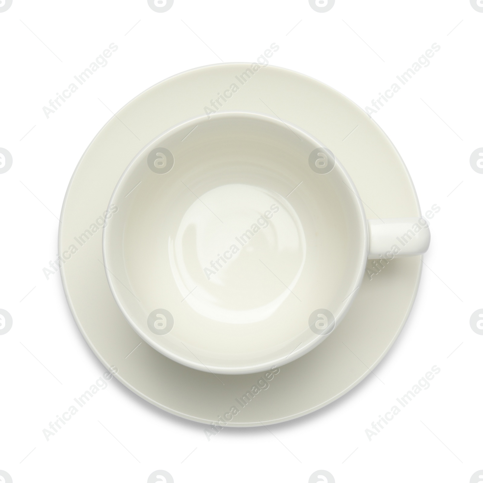 Photo of Empty cup with saucer on white background, top view