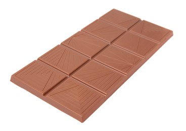 Photo of Delicious milk chocolate bar isolated on white