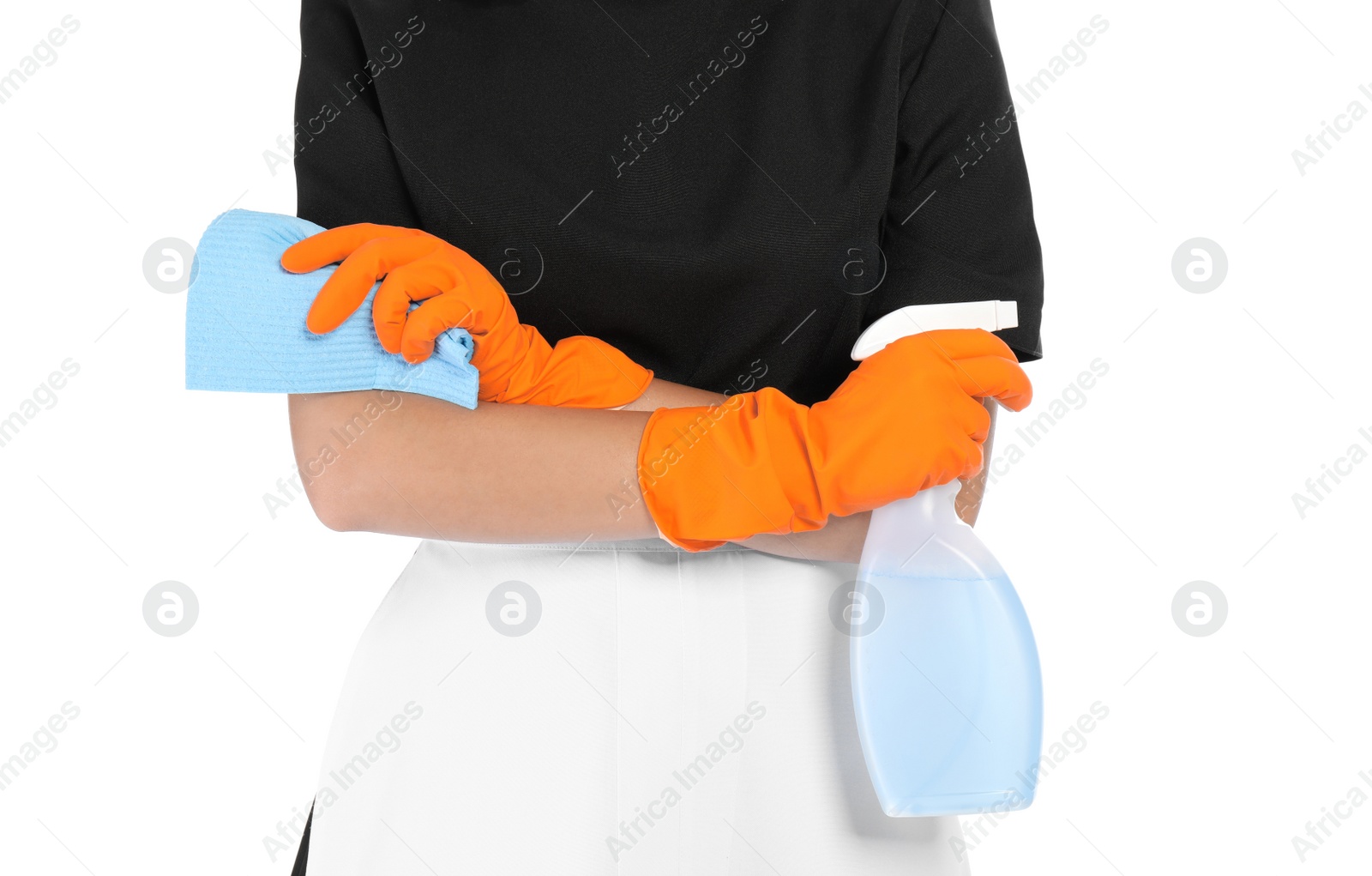 Photo of Young chambermaid with rag and detergent on white background