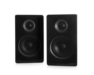 Photo of Modern powerful audio speakers on white background