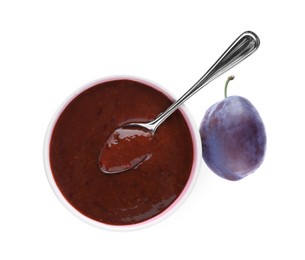 Photo of Plum puree in bowl and fresh fruit on white background, top view