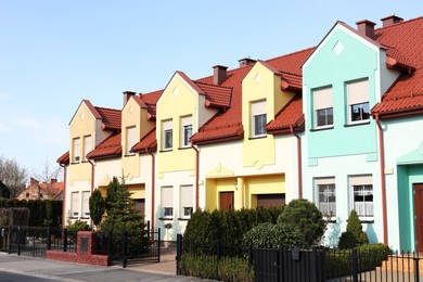 Photo of Block of houses outdoors on sunny day