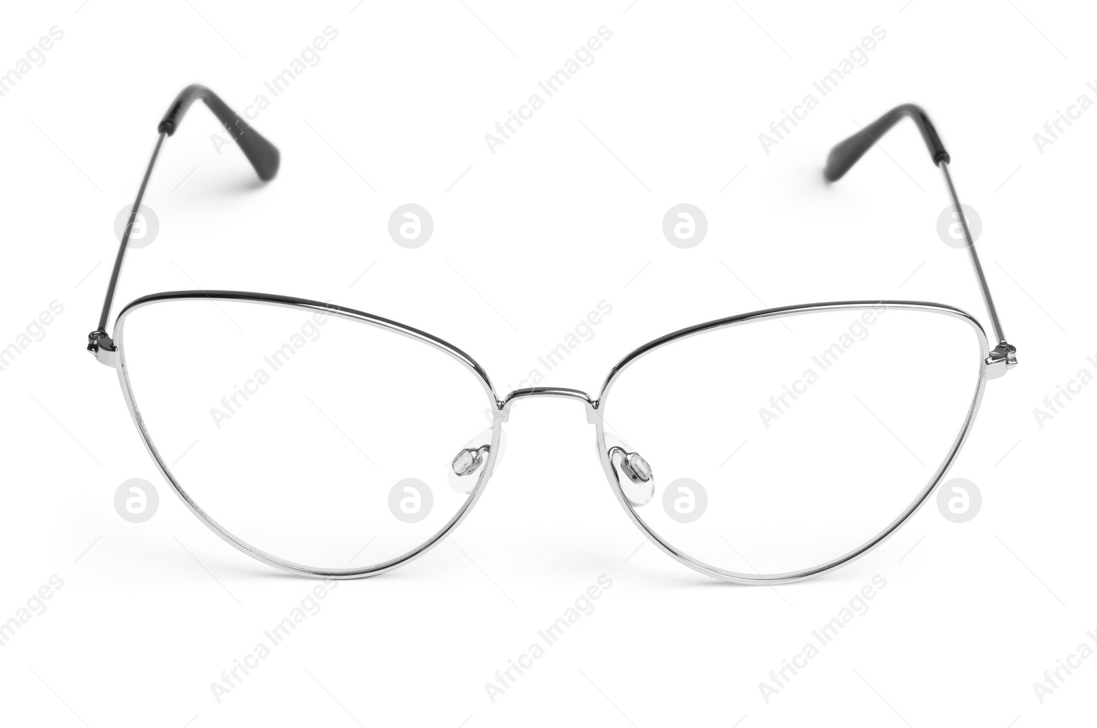 Photo of Stylish glasses with metal frame isolated on white