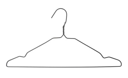 Photo of Empty metal hanger isolated on white. Wardrobe accessory
