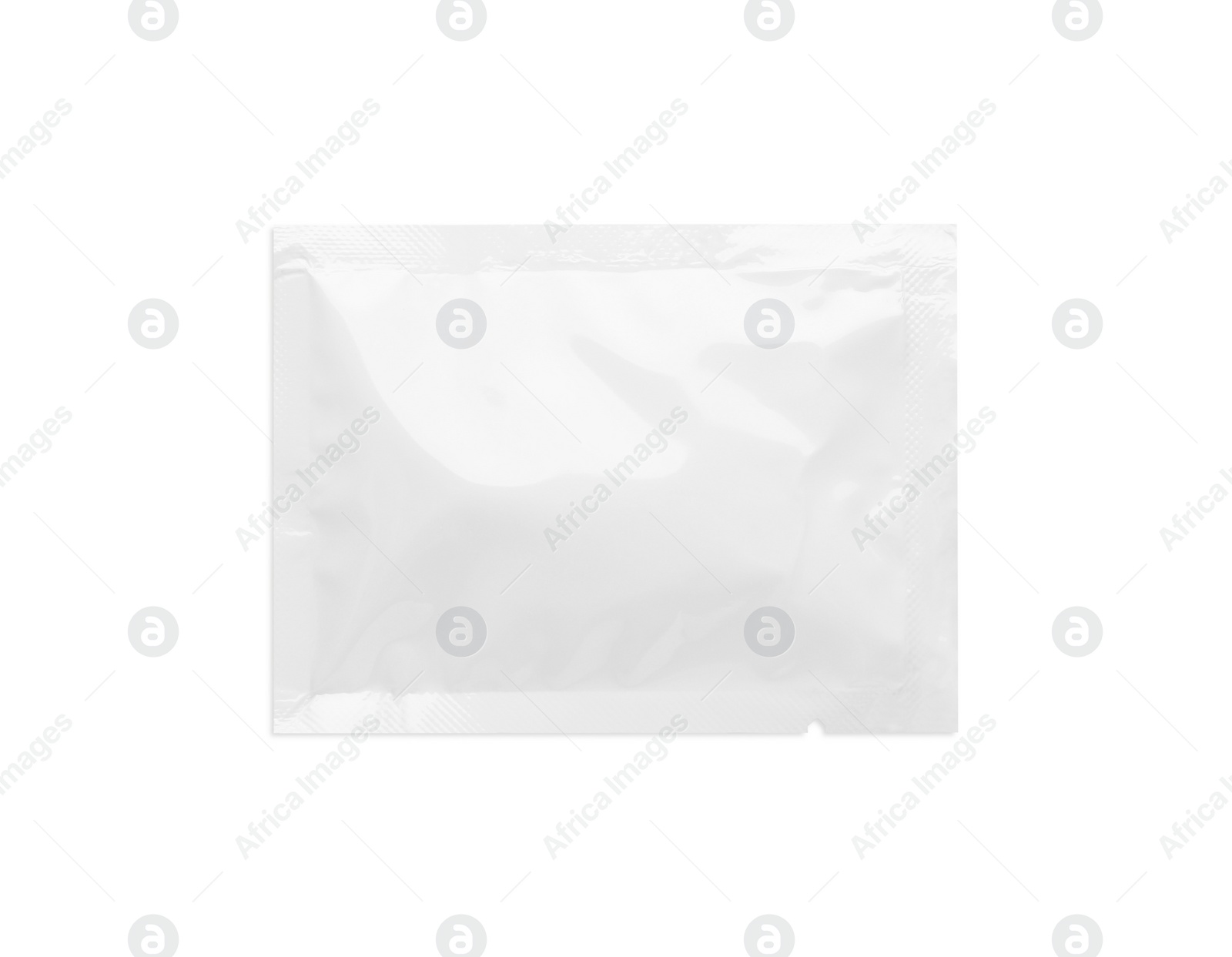 Photo of Blank sachet with wet wipe on white background, top view. Space for design