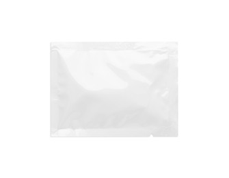 Photo of Blank sachet with wet wipe on white background, top view. Space for design
