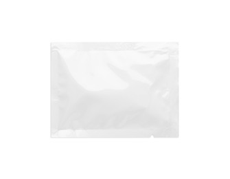 Blank sachet with wet wipe on white background, top view. Space for design