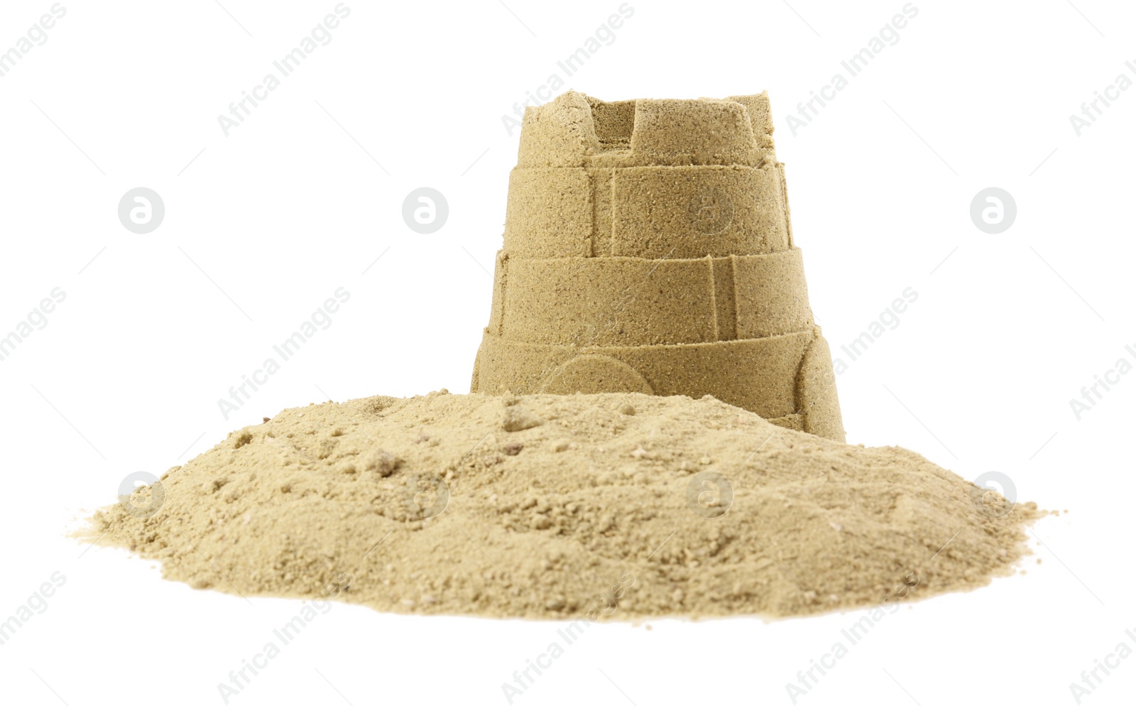 Photo of Pile of sand with beautiful castle isolated on white