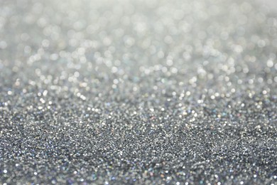 Shiny silver glitter as background. Bokeh effect