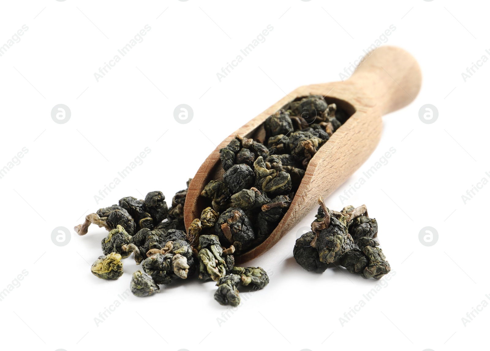 Photo of Wooden scoop with Ali Shan Oolong tea on white background