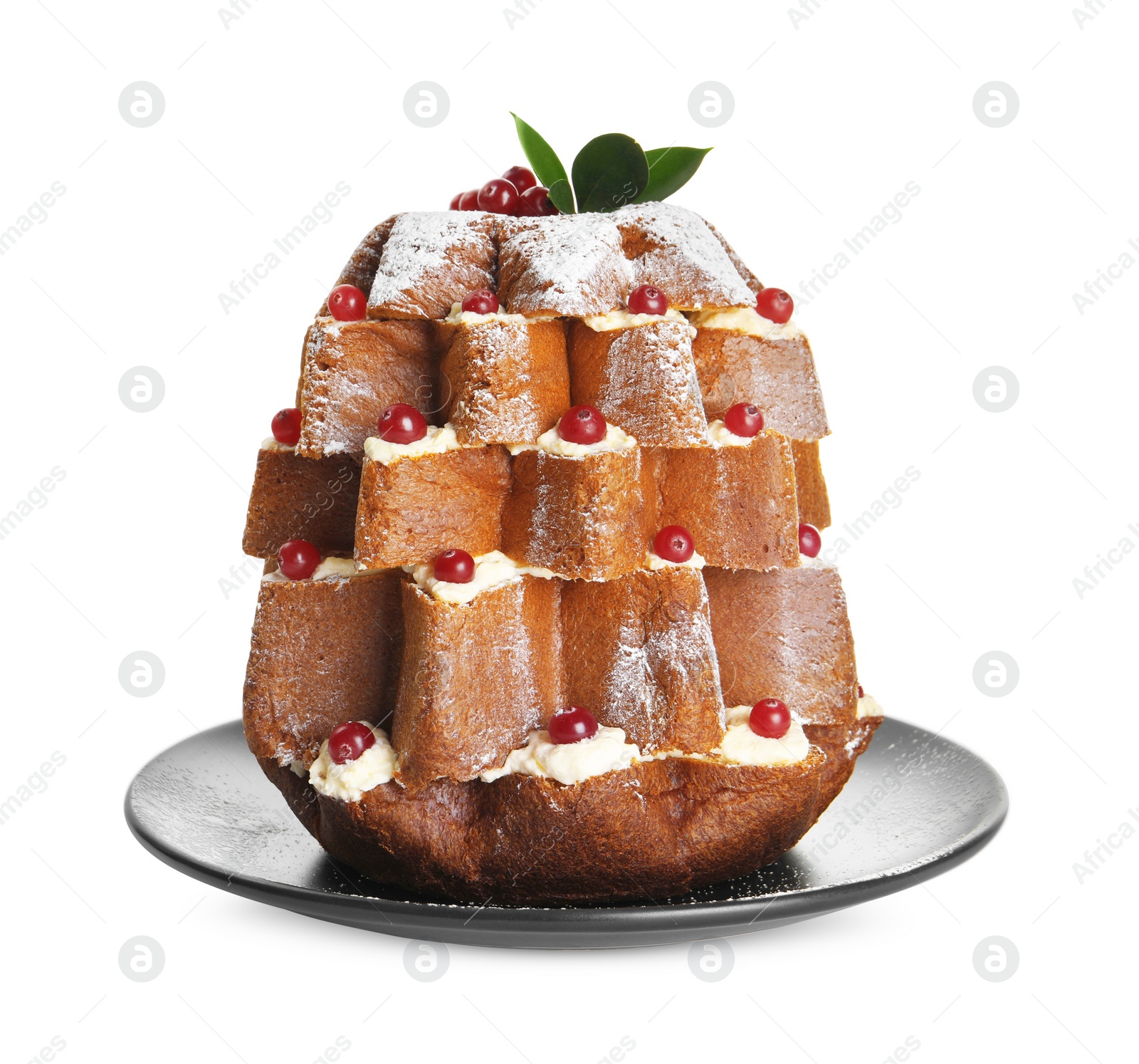 Photo of Delicious Pandoro Christmas tree cake decorated with powdered sugar and berries on white background