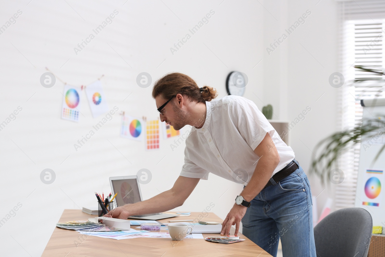 Photo of Professional interior designer at workplace in office