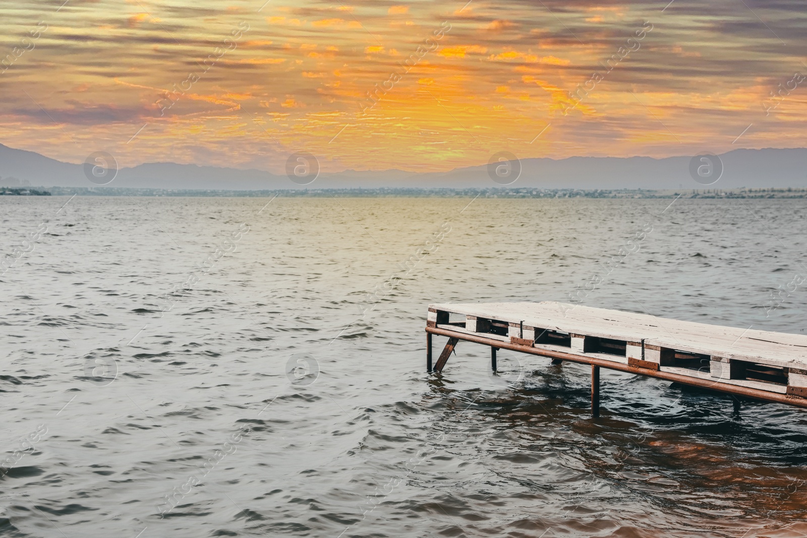 Photo of Beautiful river scene with wooden pier on sunny day