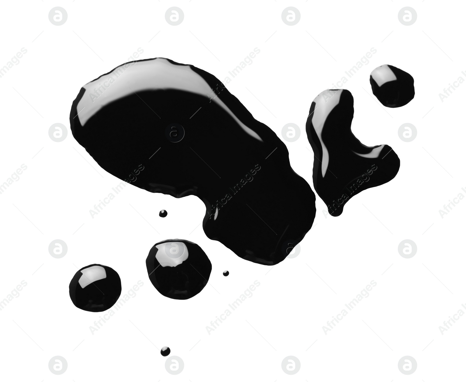 Photo of Blobs of black oil isolated on white, top view