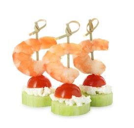 Photo of Tasty canapes with shrimps, vegetables and cream cheese isolated on white