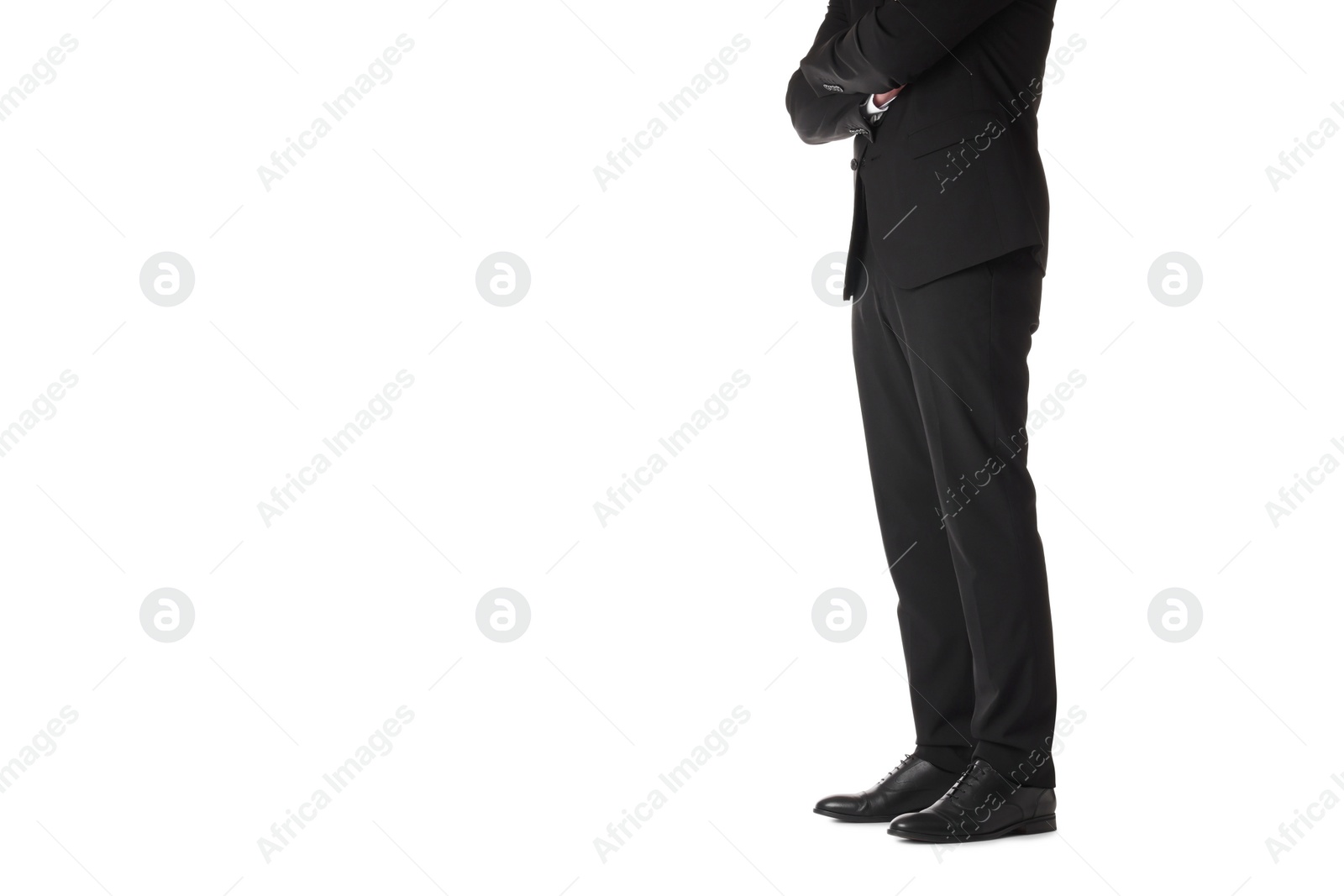 Photo of Businessman with crossed arms on white background, closeup