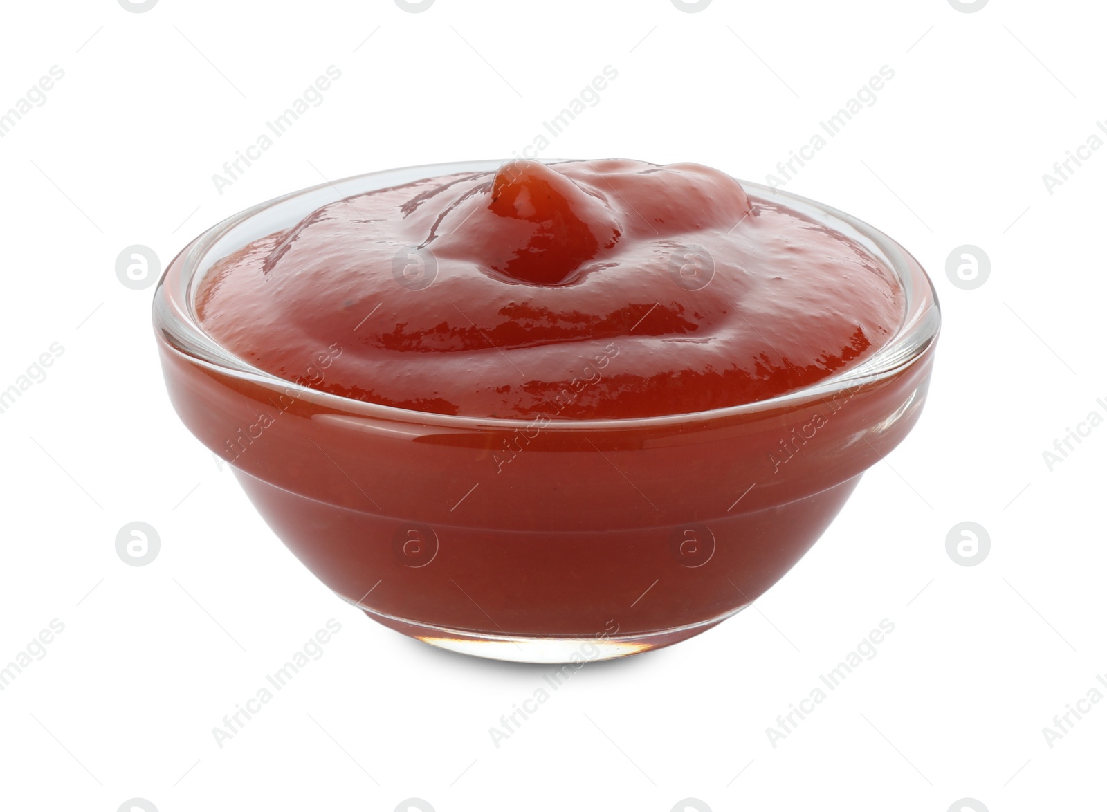 Photo of Tasty ketchup in bowl isolated on white