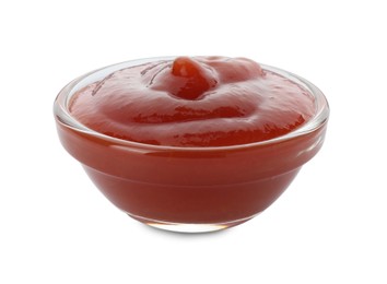 Photo of Tasty ketchup in bowl isolated on white