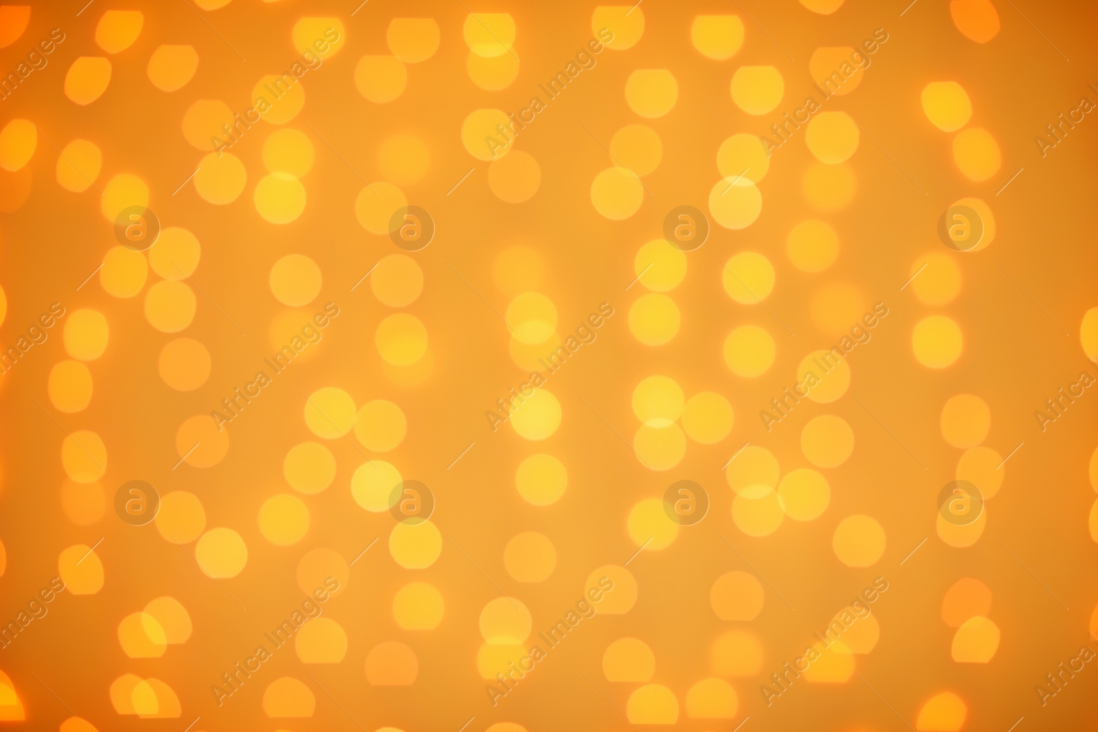 Photo of Beautiful gold lights as background. Bokeh effect